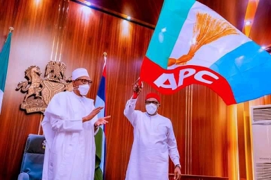 Senator Andy Uba raising APC flag as Governorship Candidate of the APC in November 6 Governorship Polls