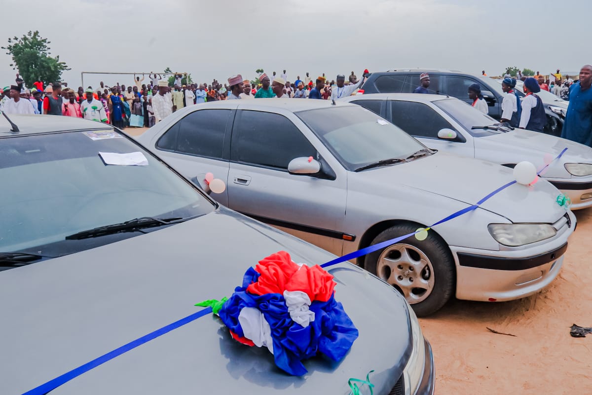 Hon. Saddam Bello Distributes Cars, Motorcycles, Other Items to Constituents