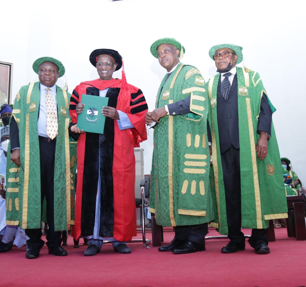 Founder and Chairman of Oriental Energy Resources Limited, Alhaji (Dr) Muhammadu Indimi, OFR (second left) receiving an Honourary Doctorate Degree in Business Administration from the Vice-Chancellor, University of Nigeria, Prof Charles A. Igwe, FAS (left); Pro-Chancellor and Chairman of the varsity’s Governing Council, High Chief Ikechi Emenike (second right), and Registrar, Barrister (Dr) Christopher Igbokwe (right) at a special convocation in Nsukka on Thursday, 21 October 2021, in recognition of Indimi’s uncommon business accomplishments and philanthropy.