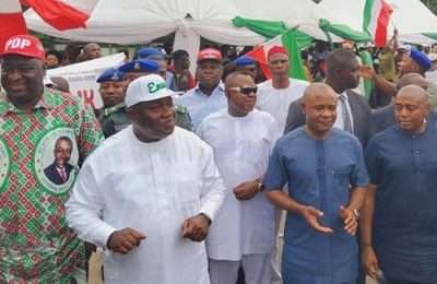Gov. Ugwuanyi in white, leading a campaign in Enugu East, for Mbah