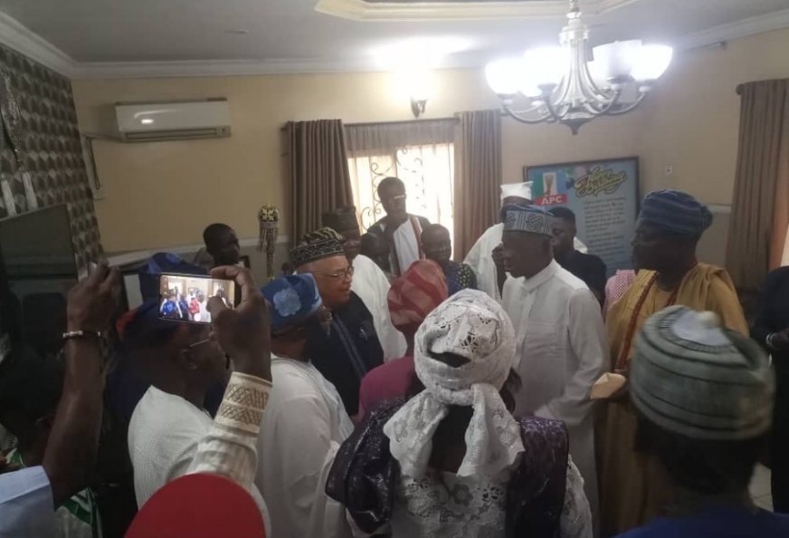 Prince Tajudeen Olusi accompanied by Otunba Dele Ajomale, Dr Abayomi Finnih and numerous others while stepping out of his sitting Room to join the Community of Imams outside for the commencement of first day Fidau inside his Compound at Sangotedo
