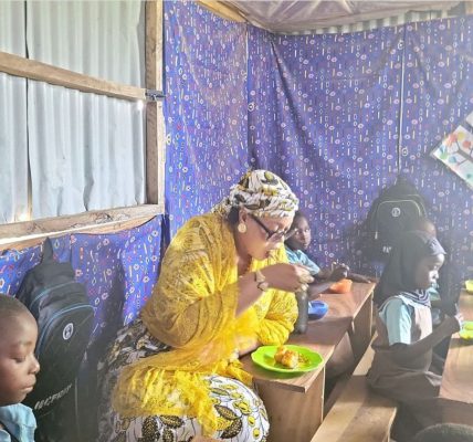 School Feeding: FG Targets Over 10 Million Children, Vows To Leave No Child Behind With Dr. Yetunde Adeniji with some of the children at Wassa