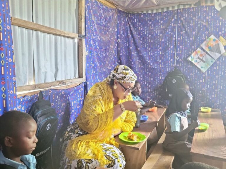 School Feeding: FG Targets Over 10 Million Children, Vows To Leave No Child Behind With Dr. Yetunde Adeniji with some of the children at Wassa