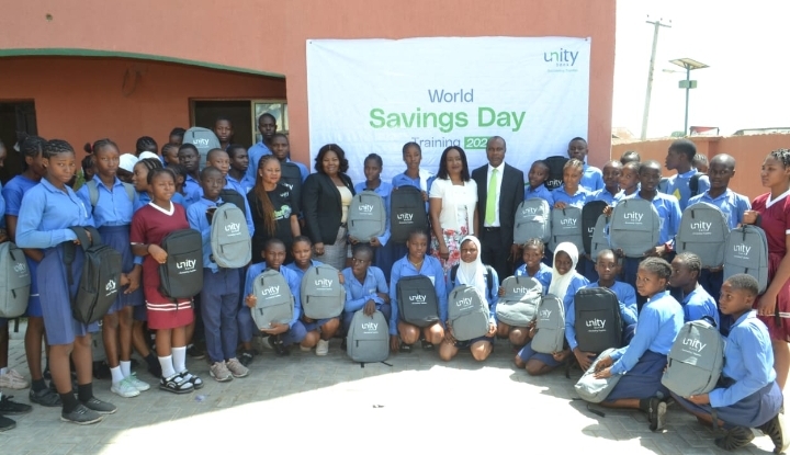 Some Unity Bank representatives and a cross section of the participants of the World Savings Day training