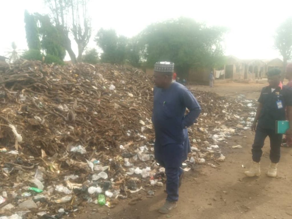The State Commissioner for Environment, Mall.Shehu Ndanusa Usman, inspecting Illegal dump site at Ganmo market, recently