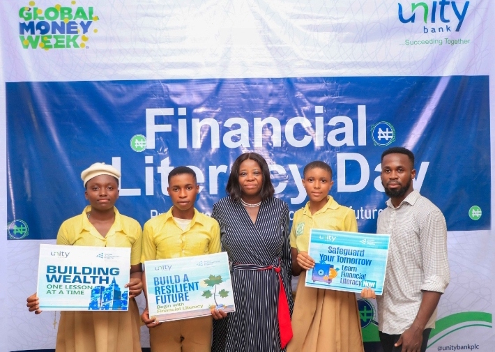 A cross-section of the outstanding students with Mrs. Ahunanya (Middle) after the training