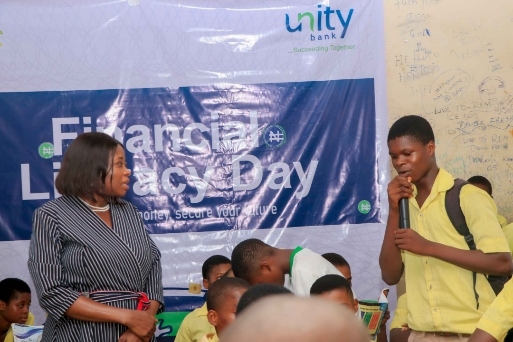 Mrs. Ahunanya and a student interacts during the training