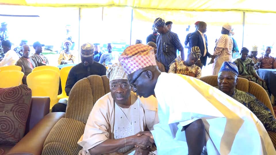 Deputy Governor of Osun State, Prince Kola Adewusi, and Comrade Awa Bamiji exchanging pleasantries at the ceremony for Kabiyesi Alayemore