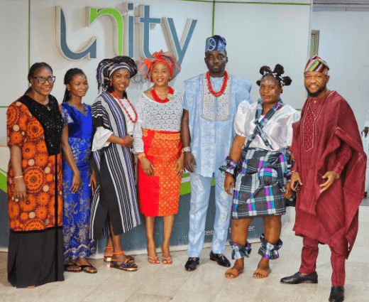 A cross section of Unity Bank team celebrating the #CustomerServiceWeek2024