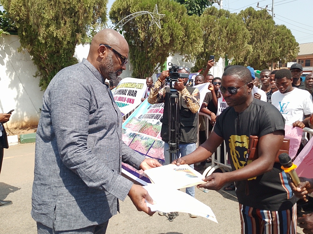 Secretary to the State Government (SSG), Dr. Kingsley Emu, during a meeting with protesters from the Ubulu-Okiti community at the Government House in Asaba