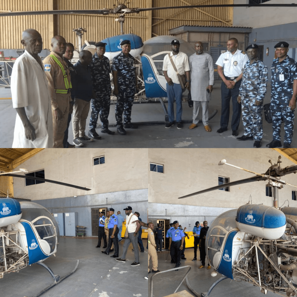 The Commissioner of Police Airwing, CP Martin Nwogoh inspects Nigeria's first Police helicopter acquired in 1972