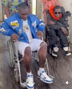 controversial activist and influencer, VeryDarkMan (VDM), has announced a personal ₦10 million bounty for anyone who can provide new unseen footage from the music video set where late Nigerian singer, Mohbad, and Zlatan Ibile sat on a wheelchair—an incident that has remained shrouded in mystery since Mohbad’s tragic death.